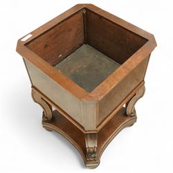Edwardian style walnut jardiniere stand, of square form, with burr walnut veneered side panels on scroll carved supports on a shaped plinth base 