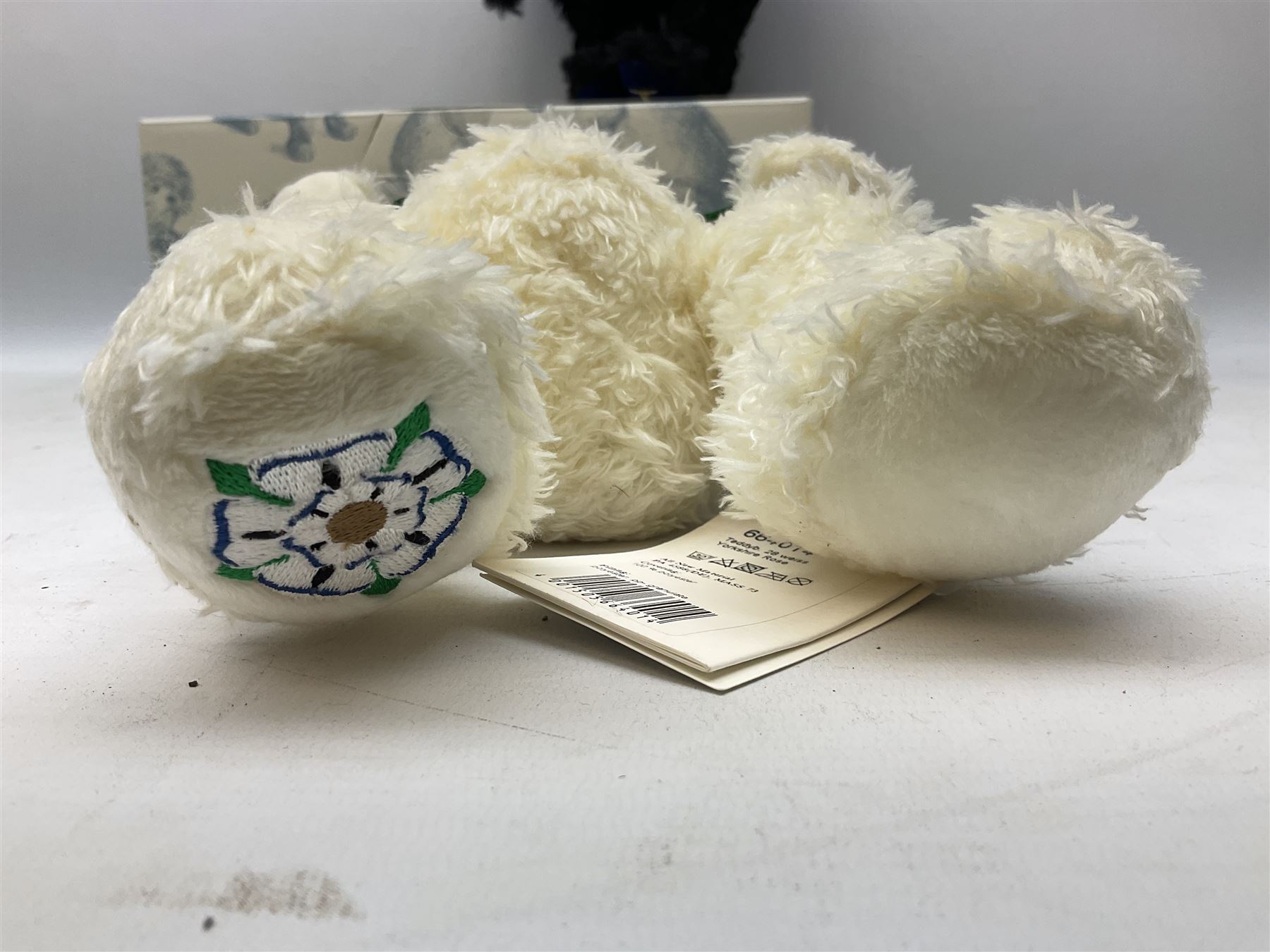 Steiff Special Edition Prince Charles black bear, with HRH coat of arms on foot and growler mechanism, with white tag ear label, in original box, together with Steiff 'Yorkshire Tyke' bear with rose on foot