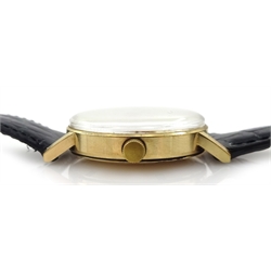 Garrard 9ct gold gentleman's automatic wristwatch, with date aperture, presented by Ford to C Jackson, hallmarked London 1976, on leather strap in original Ford case