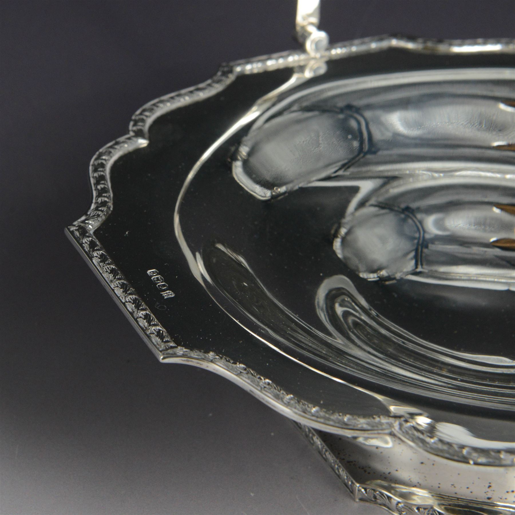 1920s silver swing handled pedestal dish, of octagonal form with shaped rim and foliate border, upon a similar pedestal, hallmarked Cooper Brothers & Sons Ltd, Sheffield 1922, not including handle H7cm