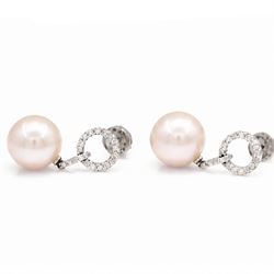 Pair of 18ct white gold pearl and diamond pedant earrings, each stud set with a halo of round cut diamonds, suspending further diamonds and a single peach / pink pearl, stamped 750