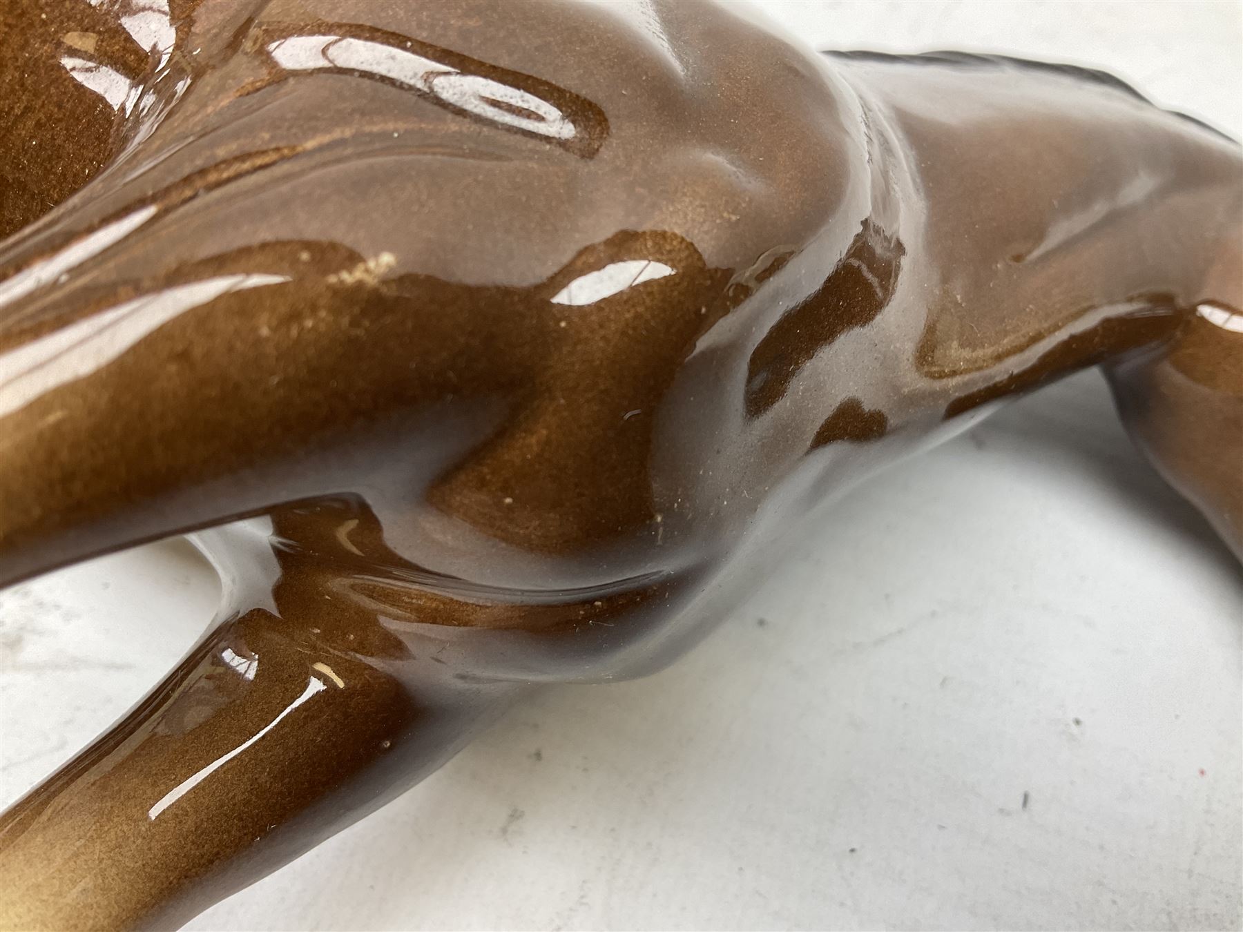 Seven Beswick figures of horses, including Connemara pony in grey no.1641, Arab in bay no.1265, large foal in grey no.947 etc, together with a Goebel figure of a horse (8)