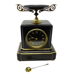  19th century French black slate mantel clock, dial with black Roman numerals indistinctly inscribed, twin train movement striking the half hours on a bell stamped 670, case surmounted with a tazza and with brass bezel, mouldings and feet, H30cm, W22cm, D15cm  
