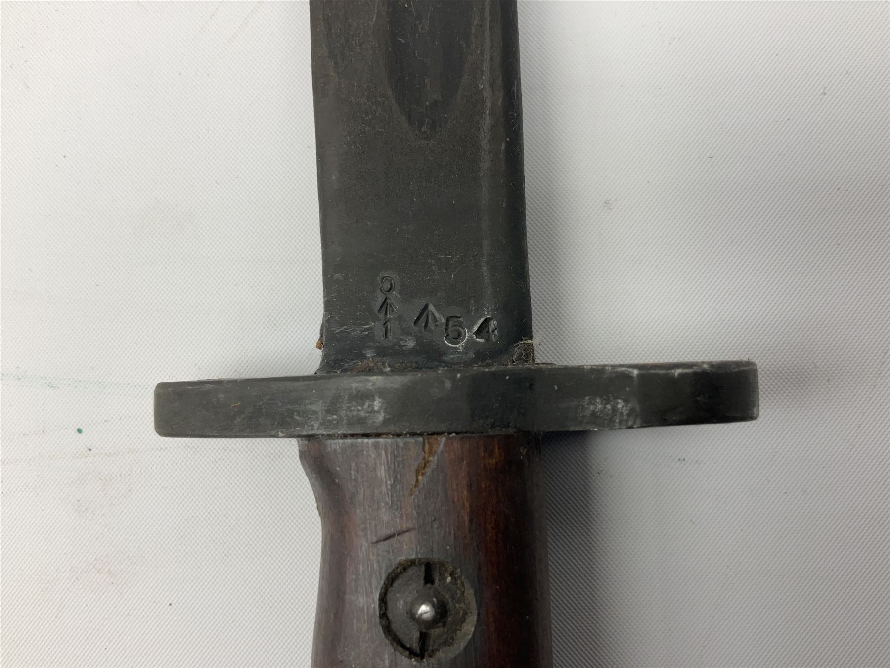 Australian Owen sub-machine gun bayonet, the 25.5cm fullered steel blade marked '53'; in metal bound wooden scabbard marled MA53 L41cm overall