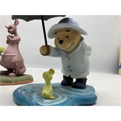 Collection of eight Disney Pooh and Friends figures, comprising Hip, hip Poohray for birthdays, Tricks and treats for someone sweet, We'll share forever whatever the weather, Thanks for being a Caring Sort of Bear, Now it's perfect just like you, Have a red-shirt red letter day, Life is sweet and I love you Mama, all with boxes
