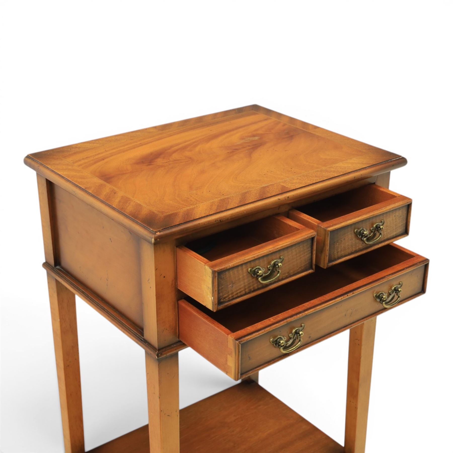 Georgian design mahogany lamp table, fitted with three small drawers, raised on square supports united by a full length undertier