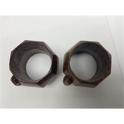 Mouseman - two oak napkin rings, bulbous octagonal form carved with mouse signature, by the workshop of Robert Thompson, Kilburn 