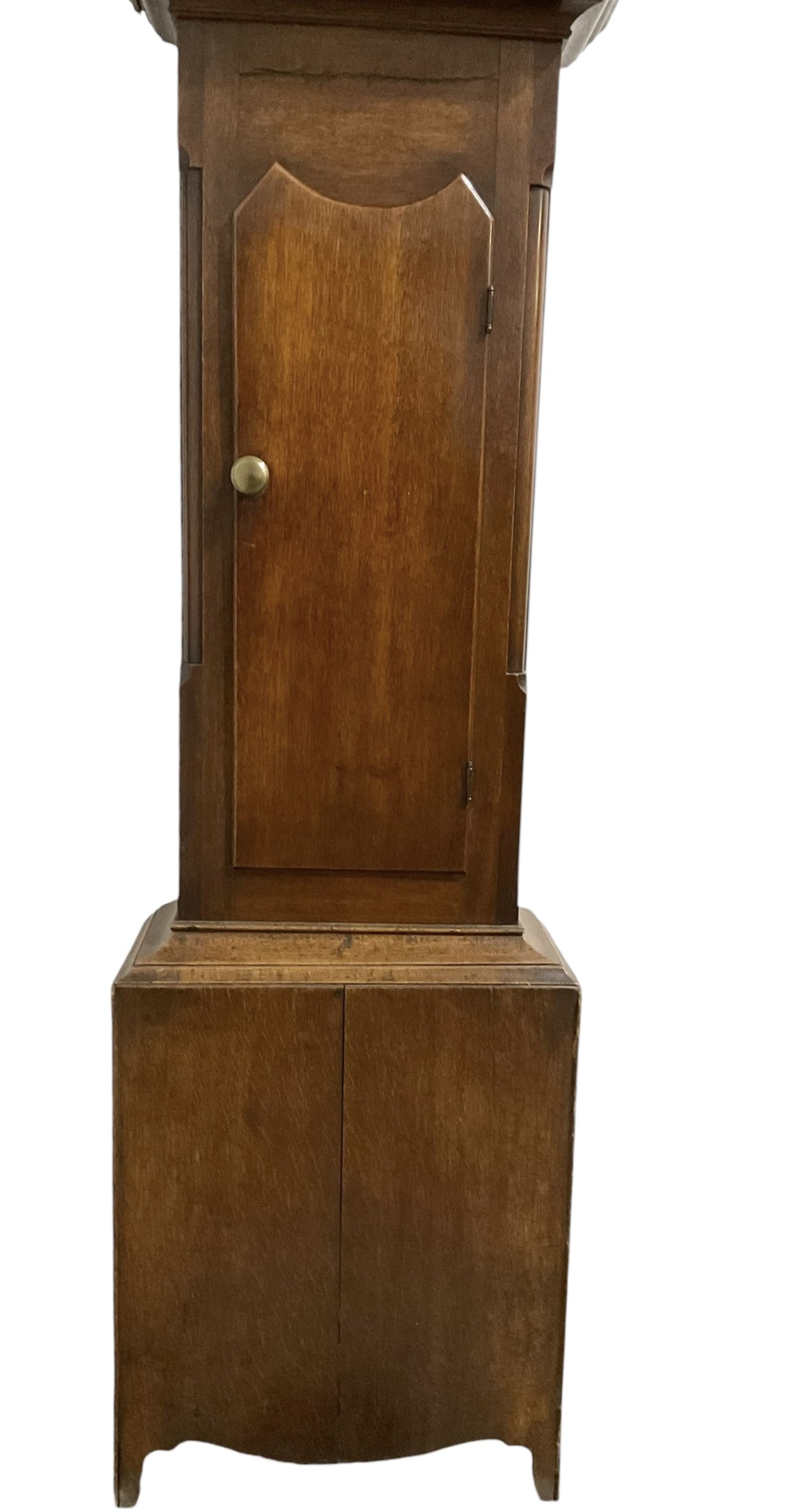 Michael Johnson of Barnard Castle (Yorks) - 30hr oak cased longcase clock c1820, with a swan necked pediment and central finial, break arch hood door flanked by turned pilasters, trunk with canted corners and a long door with a concave shaped top, on a rectangular plinth with a shaped base, painted dial with Arabic numerals, makers name, brass stamped hands and date aperture, countwheel striking, chain driven movement striking the hours on a bell.