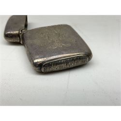 Victorian novelty brass vesta case modelled in the form of a pig holding a money bag, together with a silver vesta, hallmarked 