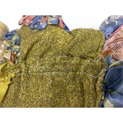 Victorian large wax over composition Pumpkin head doll, with inset dark glass eyes, moulded blonde hair in curls, stuffed body with carved and painted wooden limbs, grey painted boots, floral satin dress with netting underclothes H61cm