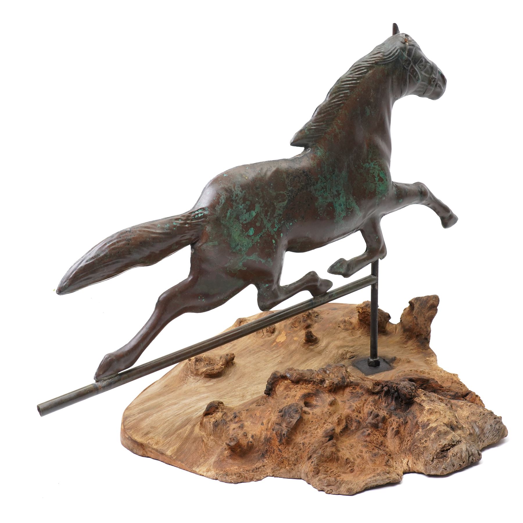 Copper weathervane formed as a leaping horse, mounted upon naturalistic base, W77cm