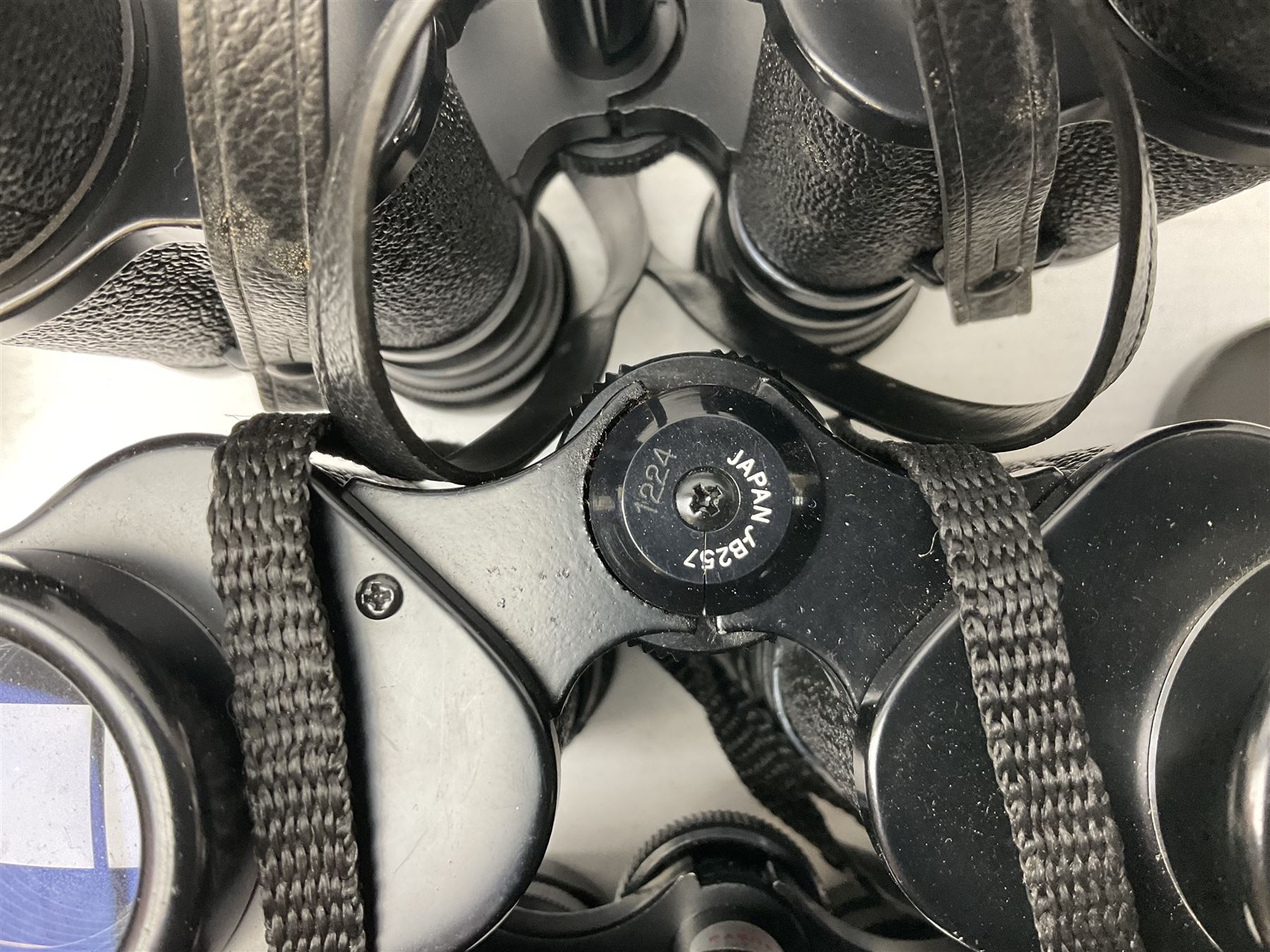 Eleven cased pairs of binoculars, to include Omiya 8x30, Tasco, Esde-Optik 8x40 Weitwinkel, Chinon 10x50 Field. Aico Rapide 8x30, Astralite zoom 6x- 14x32, etc