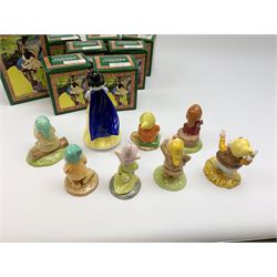 Royal Doulton Snow White and the Seven Dwarfs figurines, each with box. (8). 
