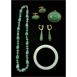 Collection of jade jewellery including bangle, necklace, pair of earrings, cufflinks and brooch