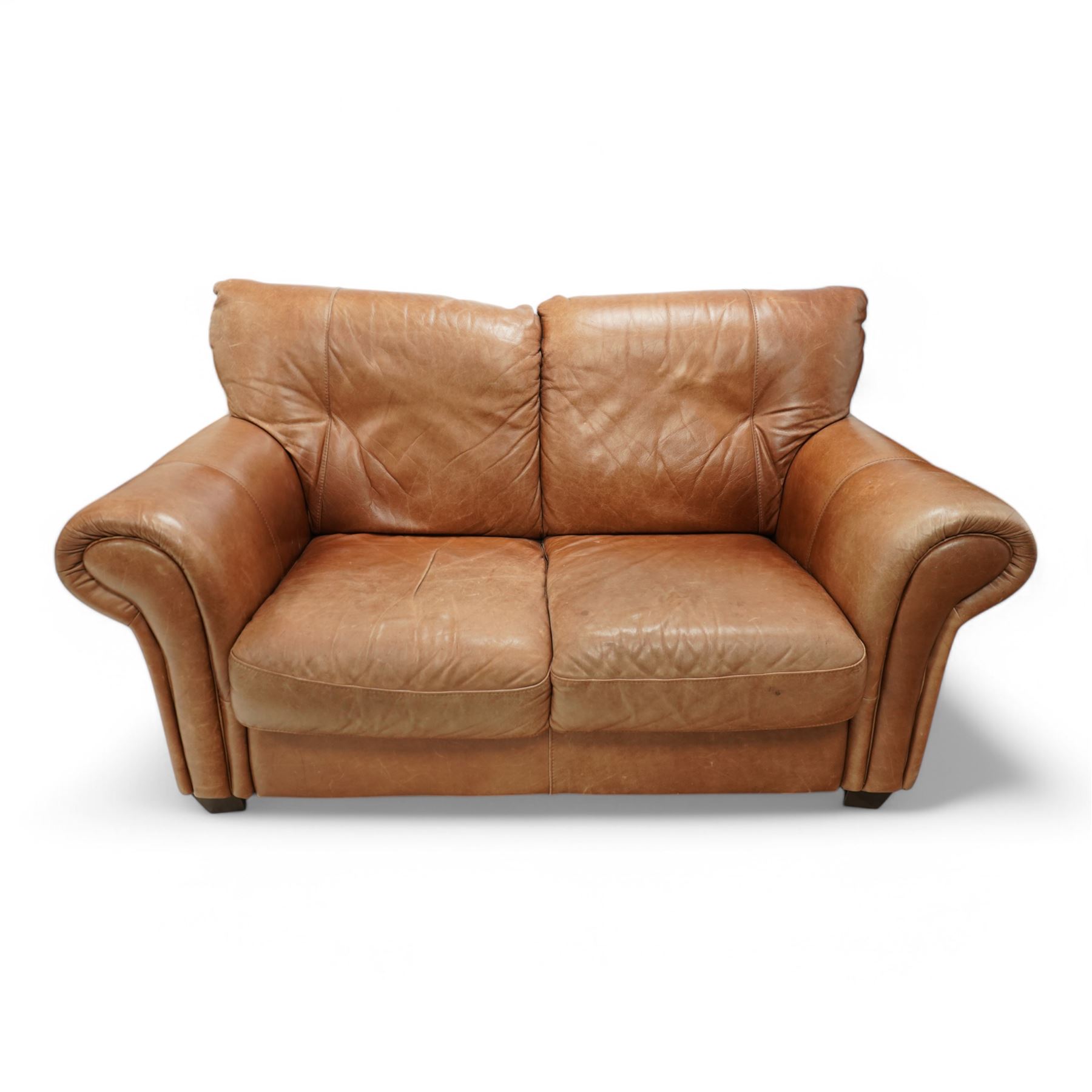 Two-seat hardwood-framed sofa, traditional shape with rolled arms, upholstered in tan leather, on block feet
