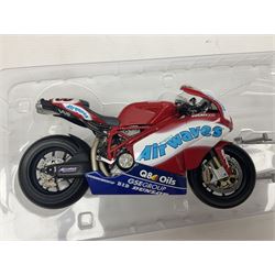 Four Minichamps 1:12 scale die-cast motorcycles - Honda RC211V Team Movistar Honda MotoGP Rider Marco Melandri MotoGP 2005; Yamaha YZR-M1 Antena 3 Yamaha D'Antin Shinya Nakano MotoGP 2003; Yamaha YZR-M1 Max Biaggi MotoGP 2002; and Ducatti 999FO4 Gregorio Lavilla BSB 2005; all boxed (4)
