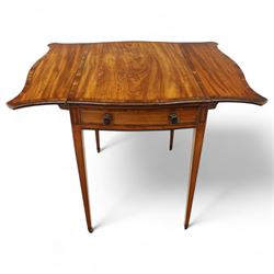 Goergian small butterfly pembroke table, the rectangular top with crossbanded edge and rounded drop leaves, single frieze drawer with opposing dummy drawer, raised on square tapering legs with stringing, terminating in brass castors