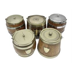 Five early 20th century biscuit barrels with silver-plated mounts