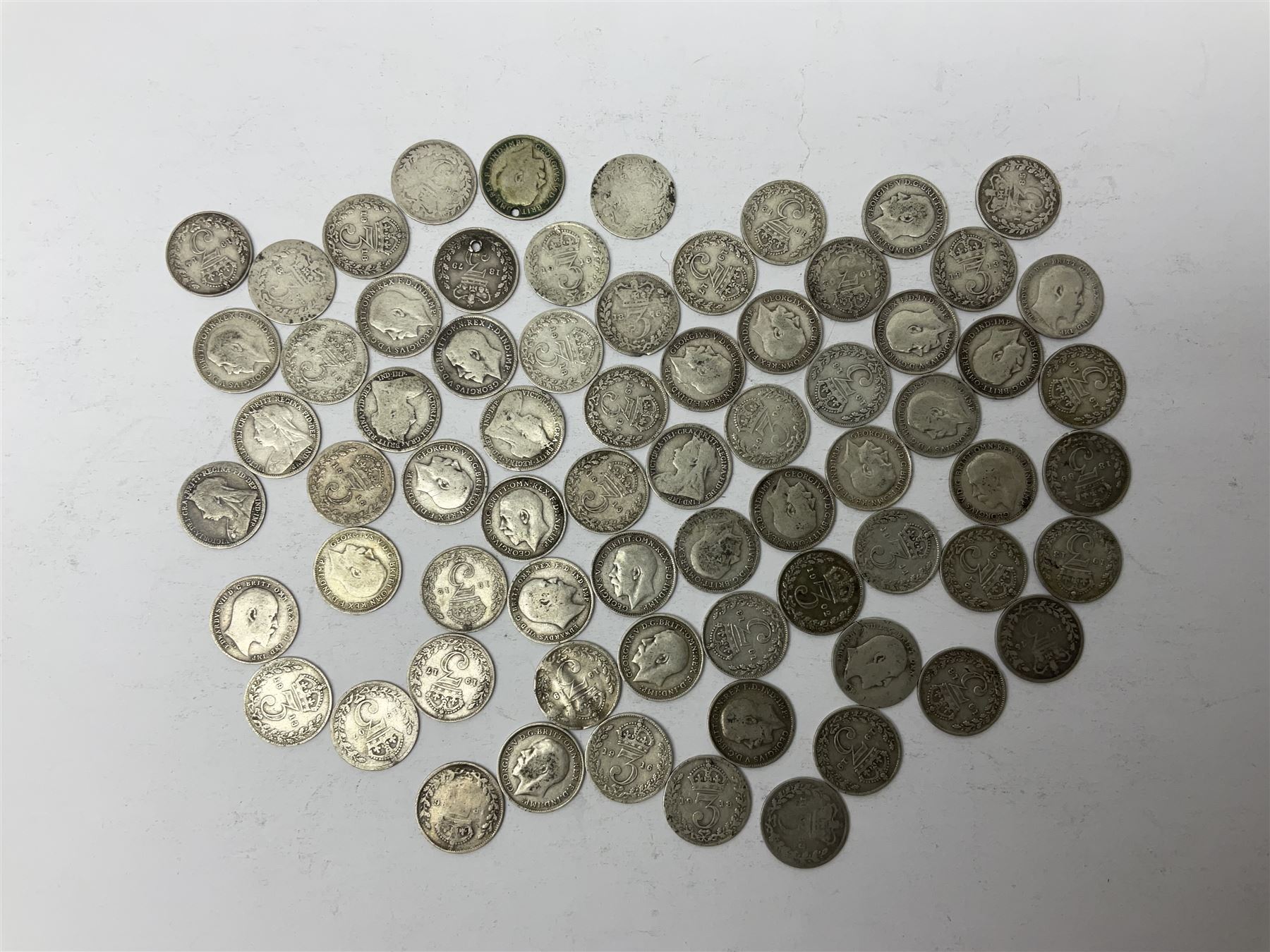 Approximately 90 grams of Great British pre 1920 and approximately 80 grams of pre 1947 silver threepence coin