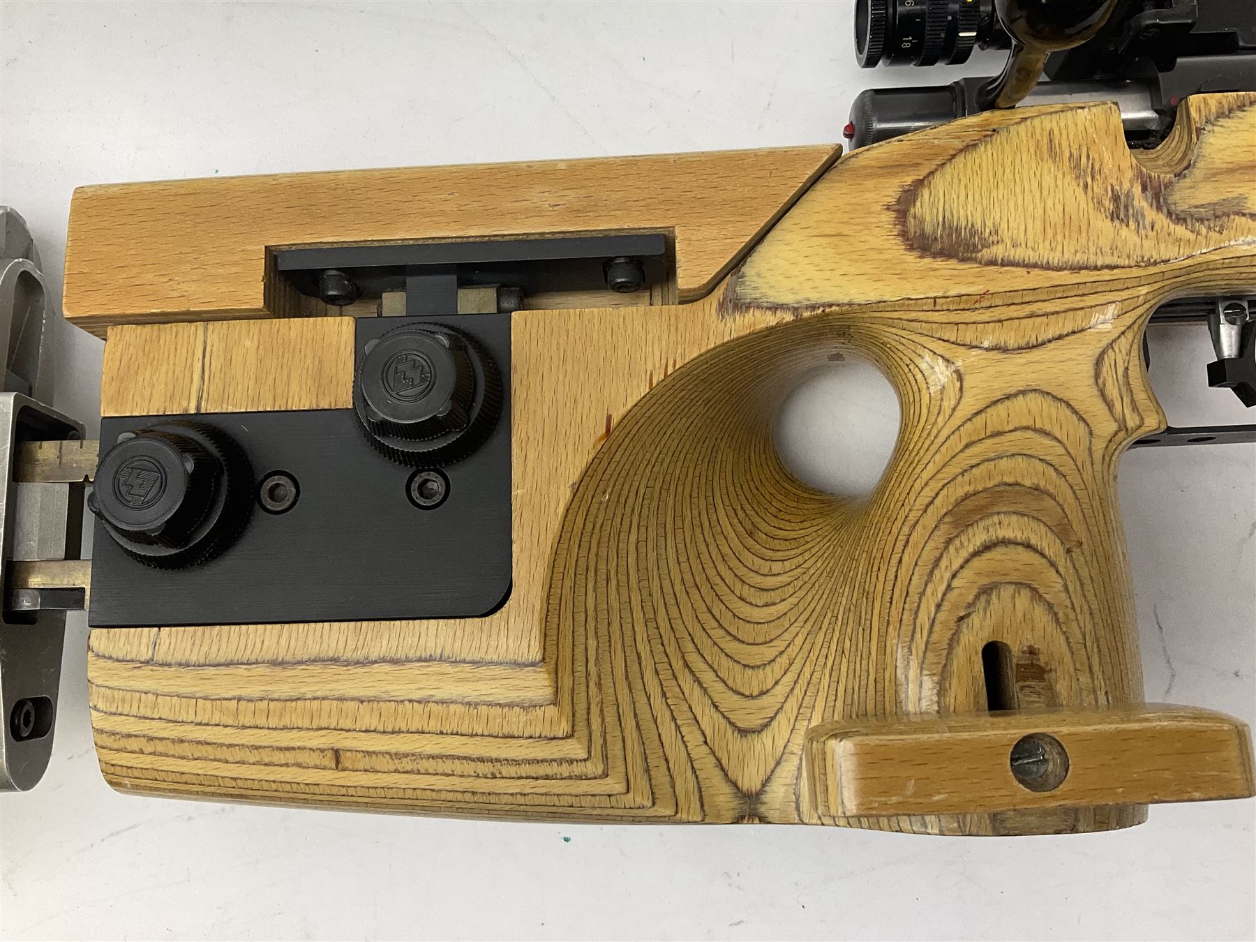 Feinwerkbau, Westinger & Altenburger Germany .22 LR bolt-action target rifle with 67cm barrel, fully adjustable weights and laminated stock, sliding weight rails and vernier rear sight; bi-pod rest at front; No.4225 L123.5cm overall SECTION 1 FIRE-ARMS CERTIFICATE REQUIRED       

