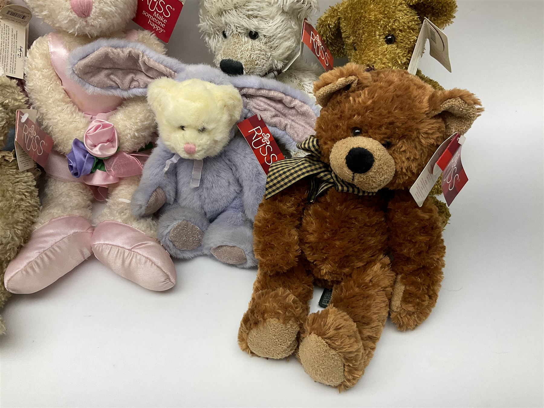 Eighteen Russ teddy bears including Ariella, Chloe, Spencer and Desmond,  mostly with tags, together with six other soft toys, tallest H42cm (24)