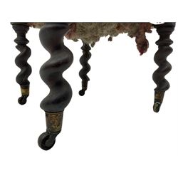 Victorian oak and wrought metal Gothic open armchair, the pointed arched back carved with foliate, cusped inner arch upholstered in red, spiral turned uprights and supports, with arms made of spiral forged metal