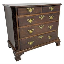 George III Chippendale design mahogany chest, moulded rectangular top with canted corners, wide canted uprights with blind fretwork decoration, two short and three long with moulded fronts, shaped brass handle plates, on ogee bracket feet 