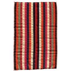 Southwest Persian Jajim Kilim ground rug, decorated with alternating vertical stripes in shades of crimson, orange, green, and black, with subtle triangular motifs woven into each stripe, bordered by narrow bands
