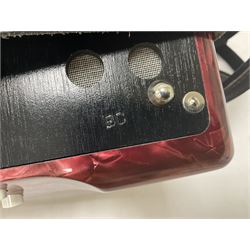 Hohner Double Ray black dot button melodeon in B/C; modern Irish style with eight bass and twenty-one treble buttons and double strap, with soft carrying case