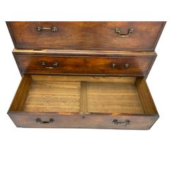 George III mahogany chest on chest, projecting cornice over plain frieze, fitted with two short and six long graduating cock-beaded drawers, on bracket feet