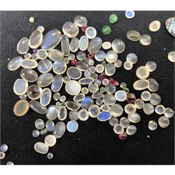 Collection of loose gemstones including four cabochon sapphires, largest sapphire approx 12.00 carat, carved jade, moonstones, pearls, turquoise, garnets, amethysts, opals, jacinth, chalcedony, carnelian and hyacinth