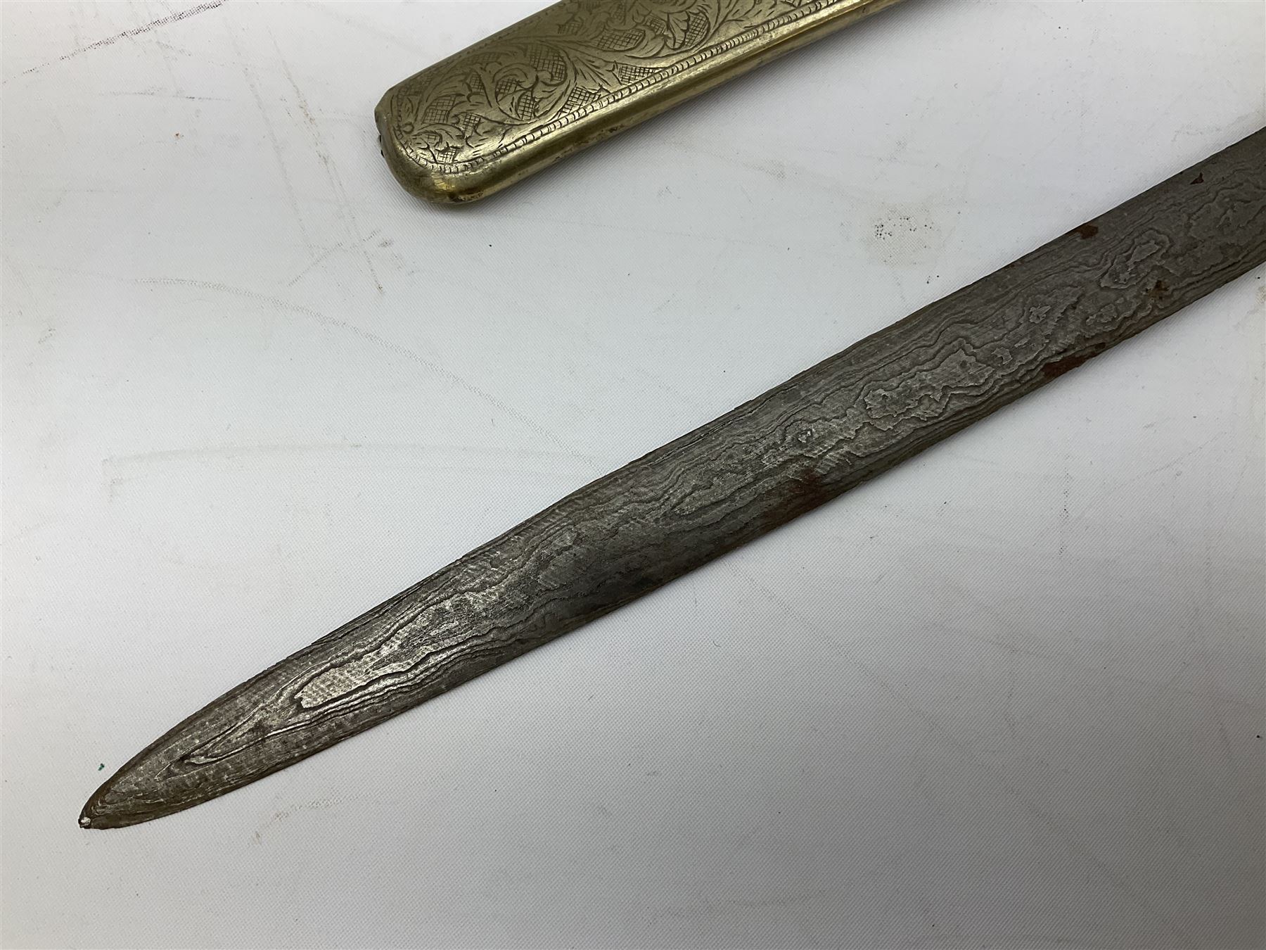 Malayan Kris dagger, the 31.5cm double edged straight heavy damascus blade with copper ferrule; carved hardwood grip; in large wooden throated scabbard with floral decorated white metal covering L47.5cm overall; a kris blade with adapted antler grip; and five various small daggers/letter openers (7)