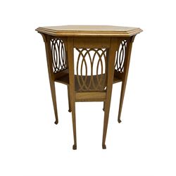 Early 20th century oak occasional table, octagonal top over under-tier with open fretwork supports