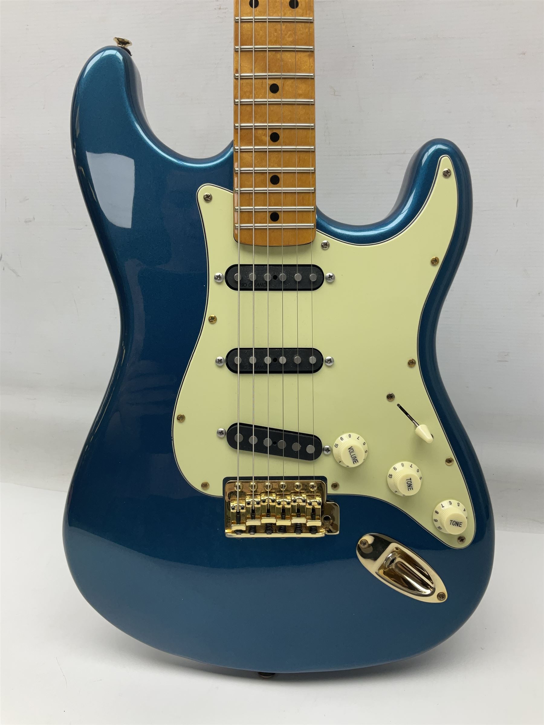 Fender Stratocaster style electric guitar in metallic blue with Rio Grande pick-ups and Fender back-plate L98cm; in Fender soft carrying case