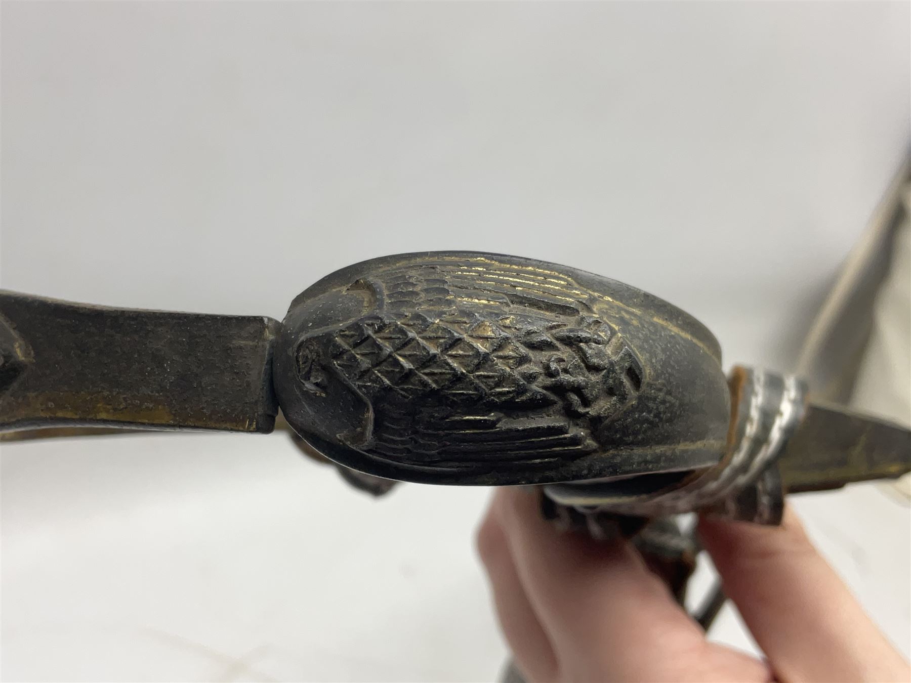 WW2 German Army Prinz Eugen Pattern Officers Dress Sword by Carl Eickhorn, the 80.5cm slightly curving fullered blade with makers name to the ricasso, gilt brass hilt with eagle to the cross-piece and relief of oakleaves to the ferrule, Prinz Eugen style down winged eagle to the pommel of the backstrap; grip retains the original wire binding; in original black painted scabbard with single hanging ring, leather hanger marked 'RZM M5/71 OLC' and silvered knot L97cm overall