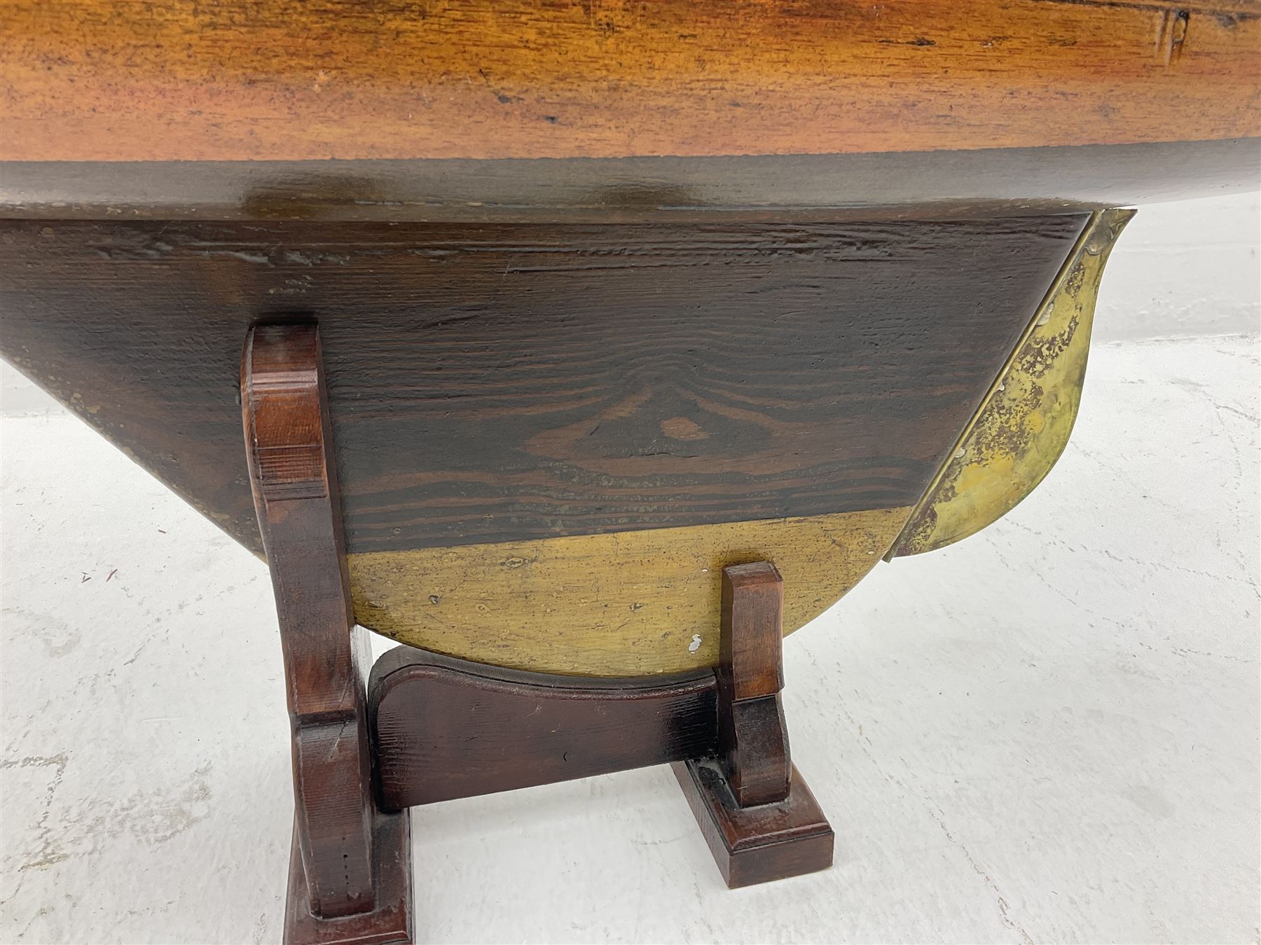 Early 20th century large pond yacht with mahogany hull, stained pine keel with brass rudder, simulated deck hatches and brass fittings, rigged as a staysail schooner (?) with four sails L117cm H148cm; loose mounted on stained pine stand