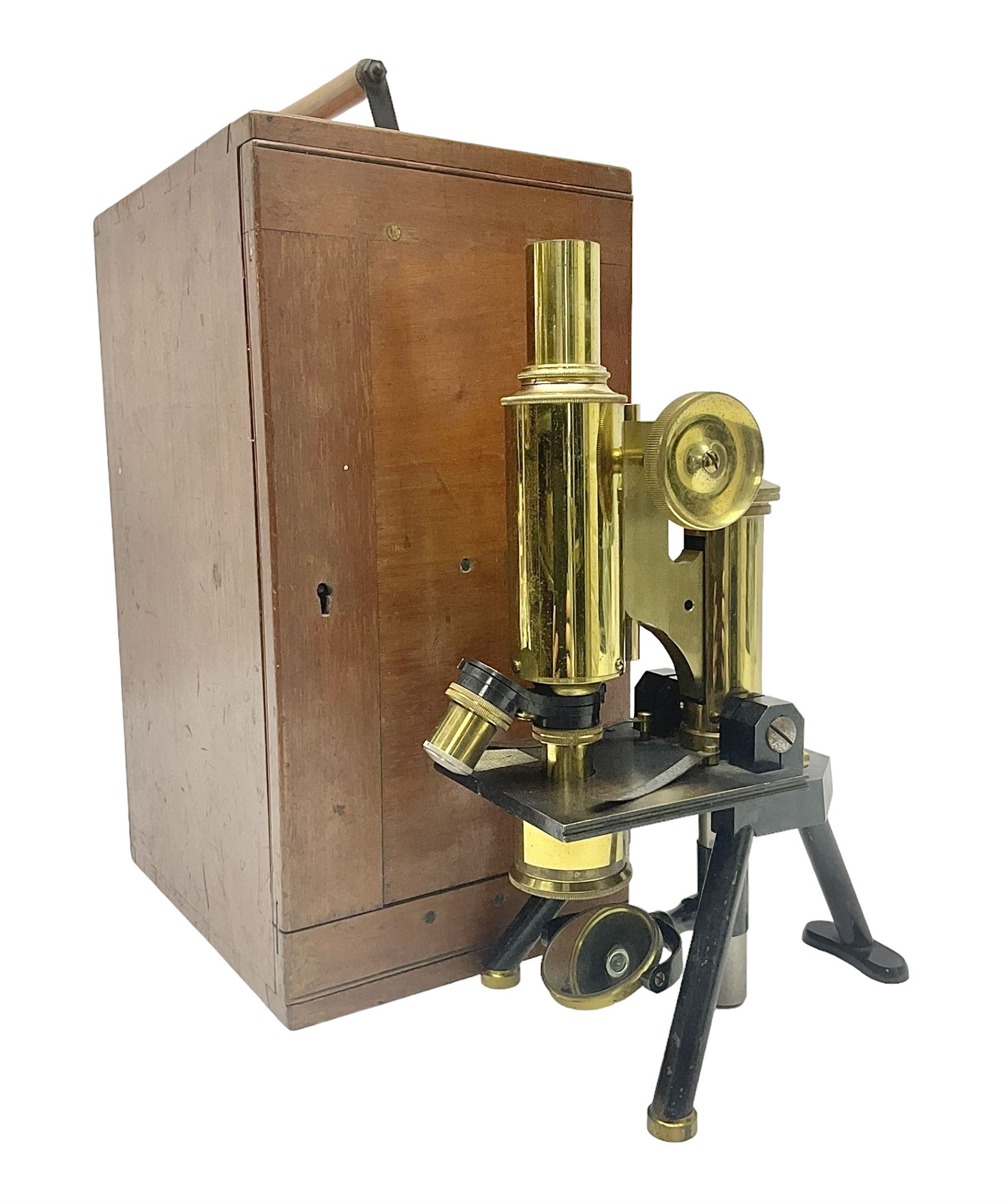 Brass lacquered microscope, by J. Swift & Son, London, in wooden carry cas no 13749, 