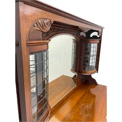 Late Victorian walnut mirror back sideboard or dresser, the raised back fitted with two curved and lead glazed cabinets, central arched bevelled mirror, the sideboard with break bowfront, fitted with six drawers and two cupboards, the cupboard doors panelled and carved with scrolls, shell and plant motifs, shaped apron with cabriole feet
