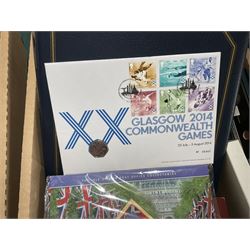 Approximately one hundred and fifteen Royal Mint coin covers, in two ring binder folders and loose, together with approximately 53 grams of Great British pre-1920 and approximately 68 grams of Great British pre-1947 silver threepence coins, and a small quantity of further pre-decimal coins