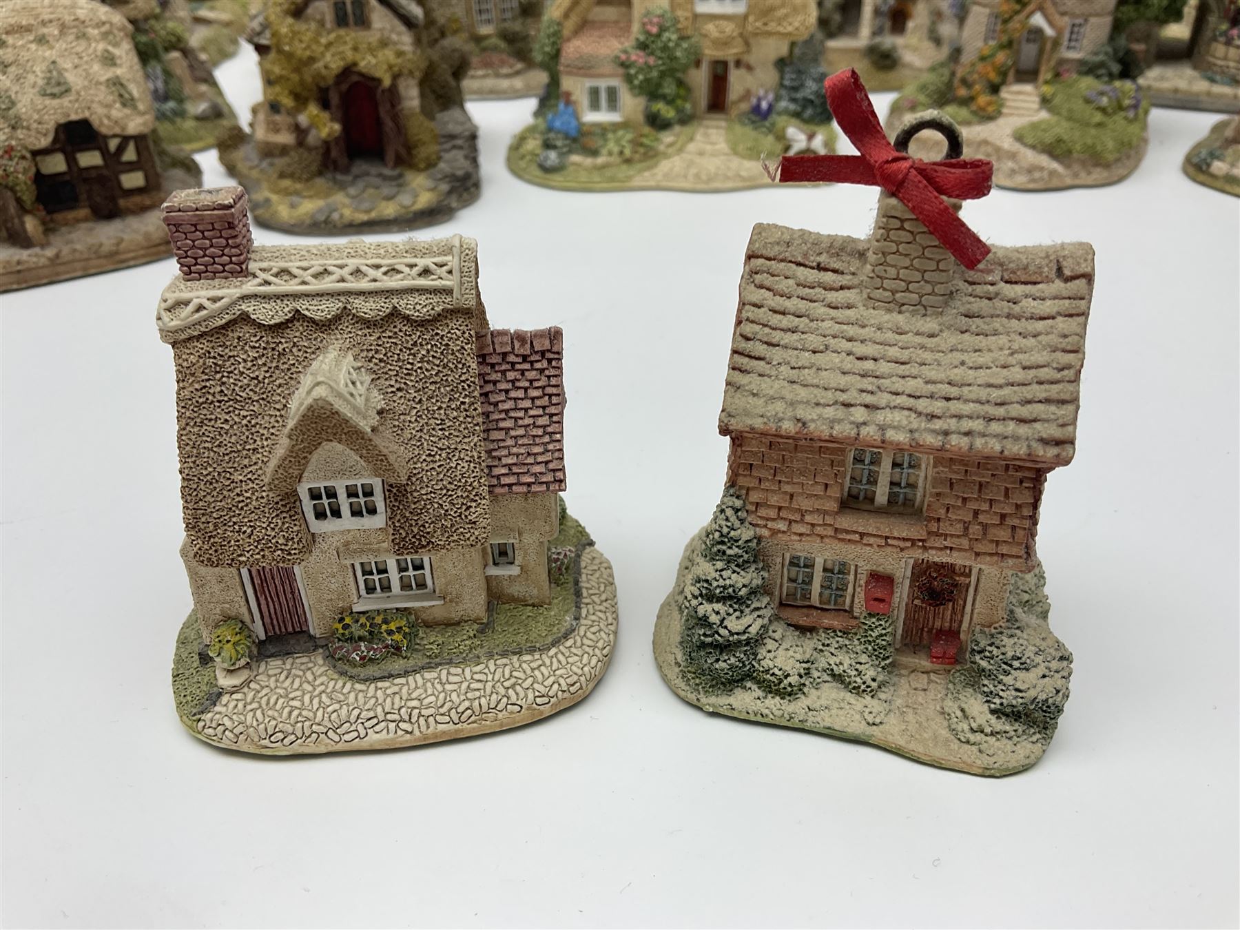 Twenty five Lilliput Lane, to include Village School, Greensted Church, The Chocolate House etc 