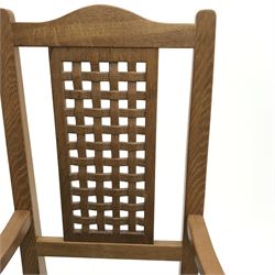 'Foxman' oak rocking chair, arched cresting rail over carved and pierced lattice splat, by Malcolm Pipes of Carlton Husthwaite, Thirsk, W55cm, H108cm, D76cm