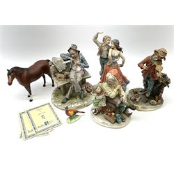 Four Capodimonte figures, comprising Shoemaker by T Galli, Tramp on Bench by Roby B, The Fiddler by Maria Angela, and Gypsy Dancers by Sandro, each with accompanying certificate, plus a Beswick matt glazed horse, and small Beswick pheasant. 
