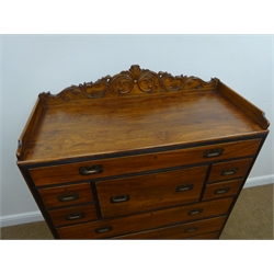  19th century ebonised banded camphor wood two section Naval campaign secretaire chest, with removable galleried back, fall front secretaire, and four long and four short drawers with recessed brass handles on turned supports, W107cm, H134cm, D49cm  