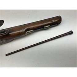 Early 19th century flintlock 16-bore overcoat/duelling pistol by William Bond Lombard Street London, the 23cm octagonal brown stub twist damascus barrel with small foresight, two barrel pins and ram rod under, inscribed Lombard Street London to the top and W. Bond to the action, full walnut stock with lightly engraved steel furniture, pineapple finial and escutcheon, half cock facility L39cm; loose mounted on later mahogany display stand with trade label