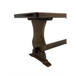 Rectangular oak coffee table, on shaped end supports joined by pegged stretcher (107cm x 40cm, H49cm), and a mahogany tripod wine table (D28cn, H51cm)