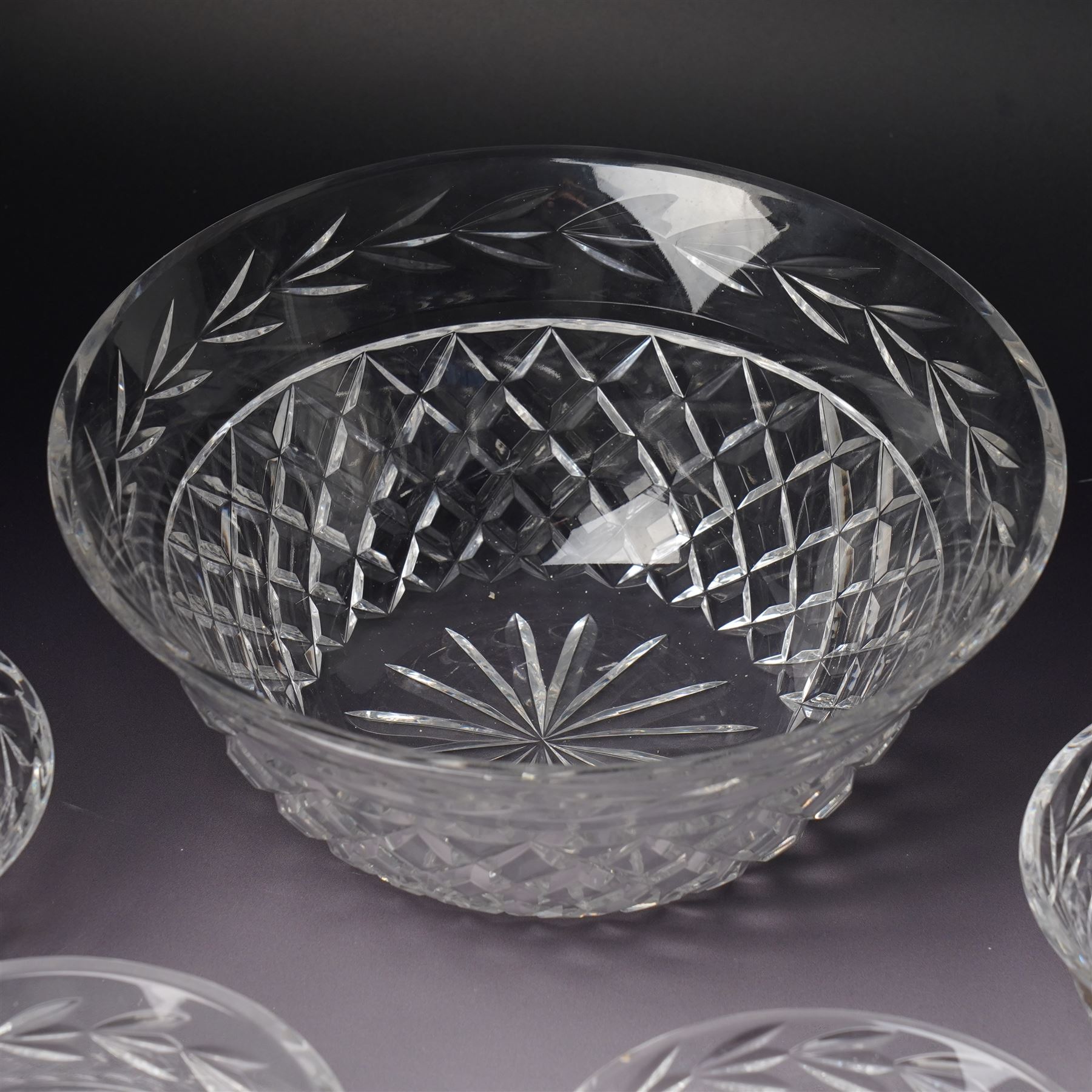 Waterford Crystal 'Glandore' pattern large bowl, boxed, and four smaller 'Glandore' pattern bowls, two boxed (5)