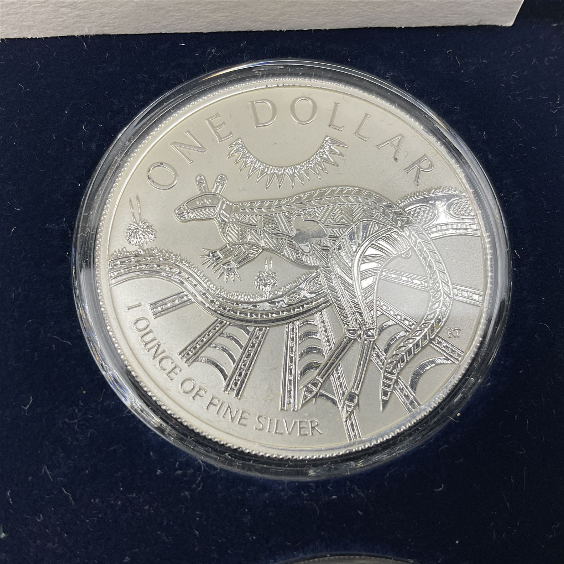 Four one ounce fine silver coins, forming 'The 2003 Famous World Silver Coin Collection', comprising United States eagle, Australian kangaroo, Chinese panda and Canadian maple leaf, cased with Westminster certificate 