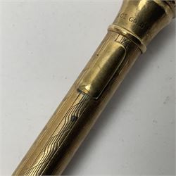 9ct gold 'Lifelong' propelling pencil, with engine turned decoration, stamped 9ct 