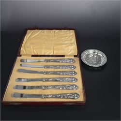 Late 20th century silver pin dish, embossed with Yorkshire rose to centre, hallmarked C J Vander Ltd, London 1971, together with a set of six silver handled King's pattern tea knives, hallmarked Kirby Beard Ltd, Sheffield 1928, contained within fitted case