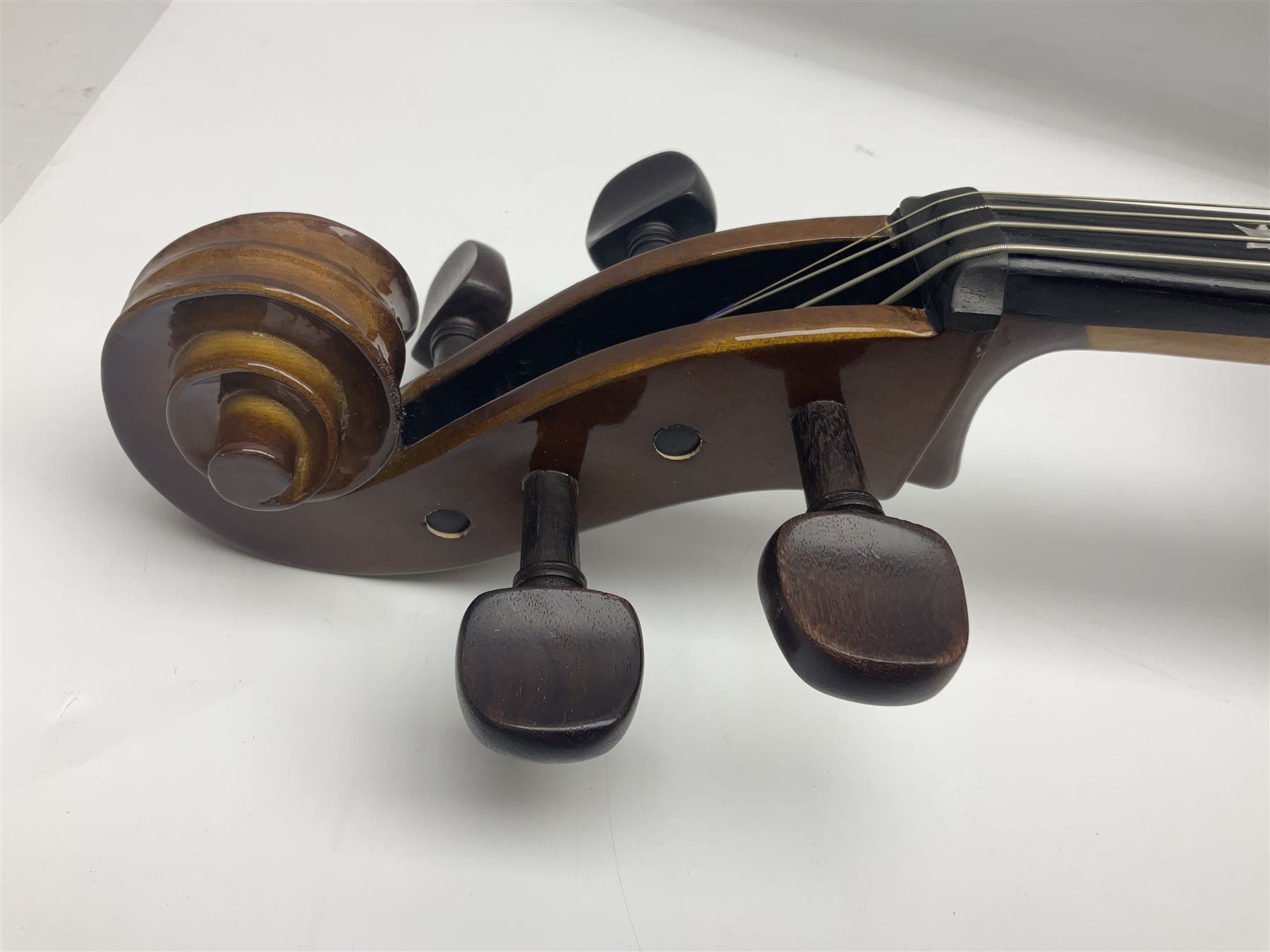 Stentor Student I quarter-size cello with 59.5cm two-piece maple back and ribs and spruce top; bears maker's label with serial no.M076096 L95.5cm overall; in Stentor soft carrying case with bow